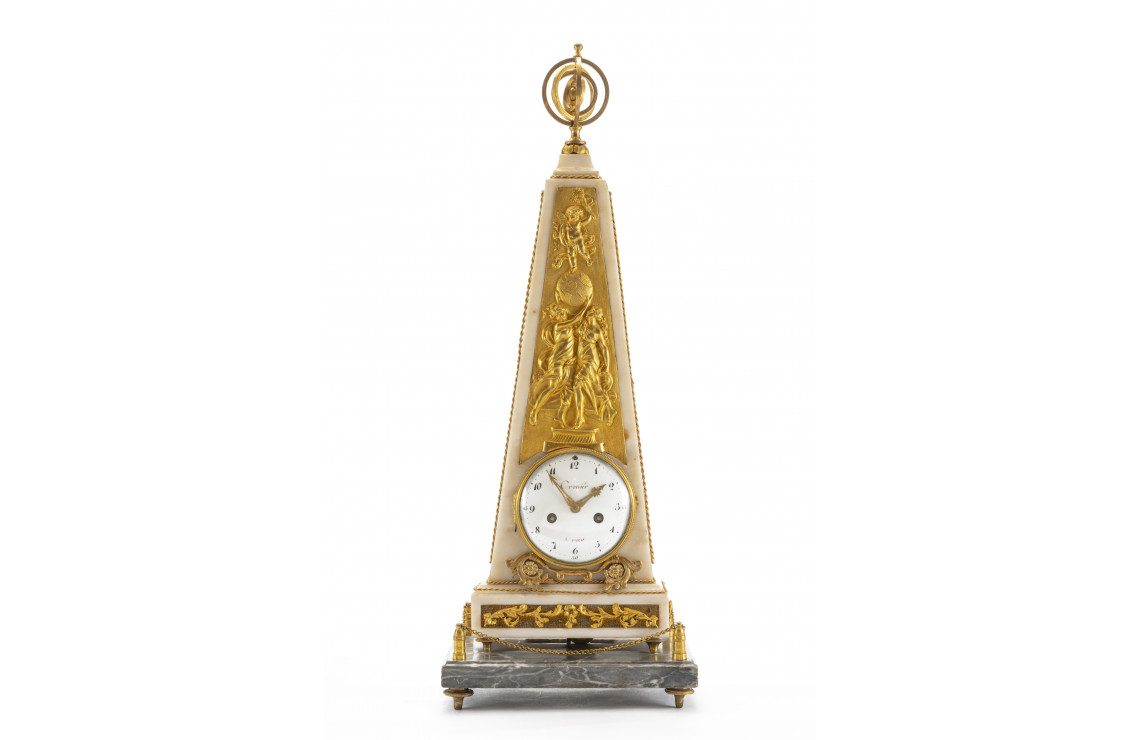 A Louis XVI clock in the shape of an…